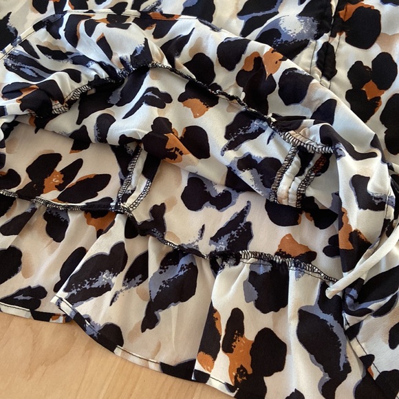 Cheeta print skirt, worn once. Blue, black, brown, and cream. Good condition. - Picture 9 of 10